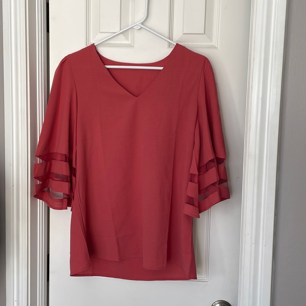 Maybe 100% polyester top. Worn maybe once.